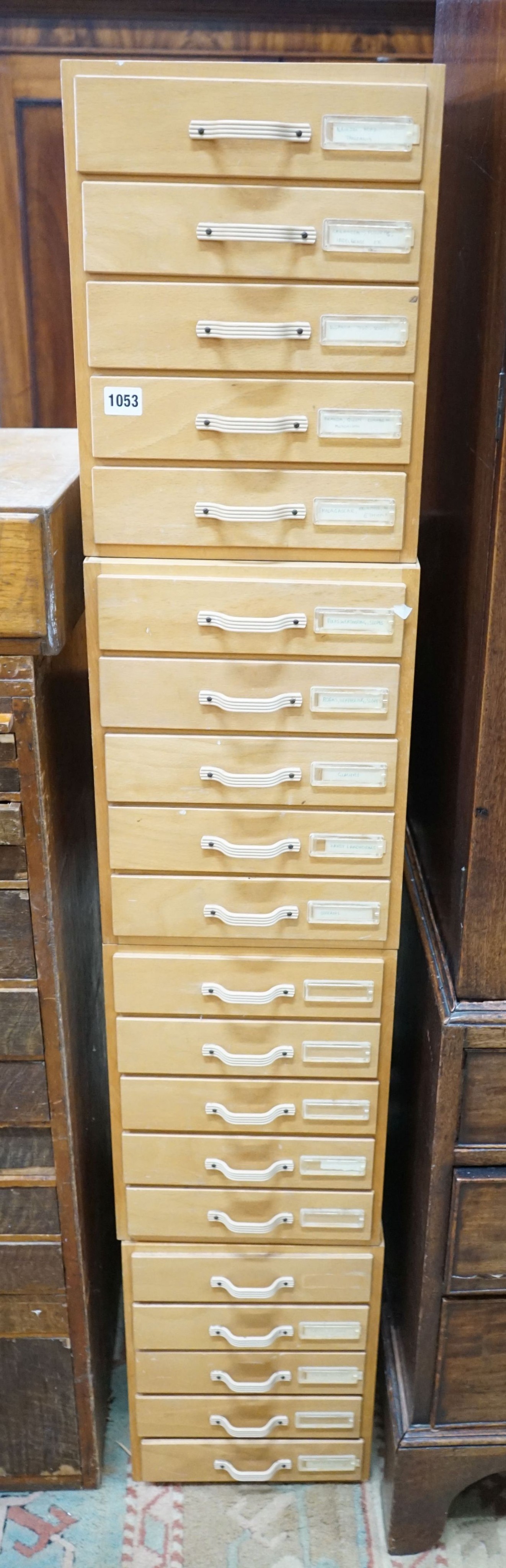 A set of four mid century five drawer photographic slide chests, width 29cm, depth 38cm, height 39cm